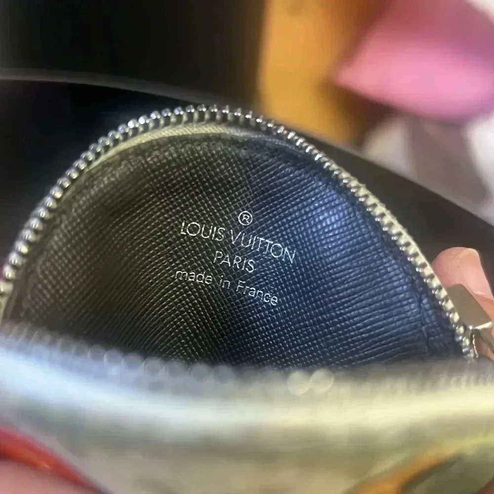 Louis Vuitton mini Lin monogram Conta De Fis coin pouch COA included